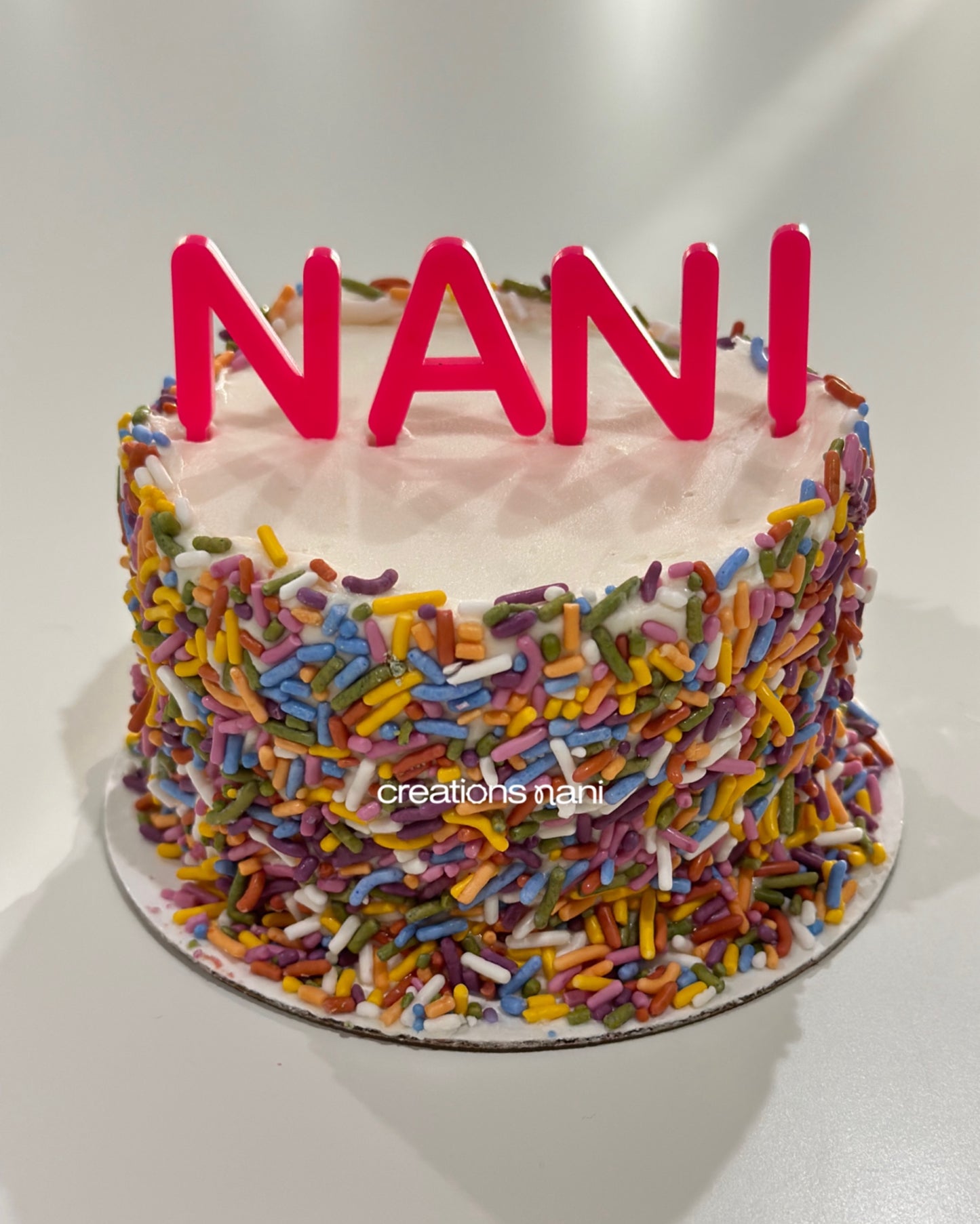 Top - Letter cake topper